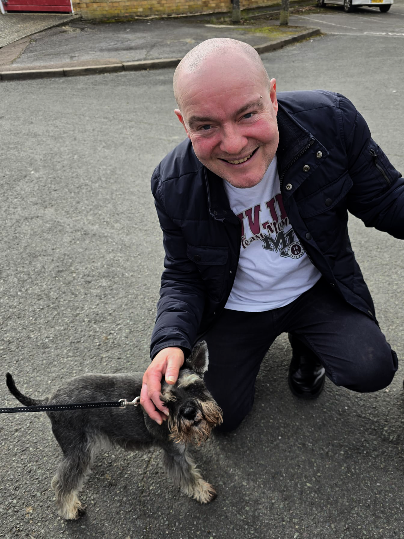 Meet the boss! Ace Pet Sitters proprietor Jon King with one his many happy charges